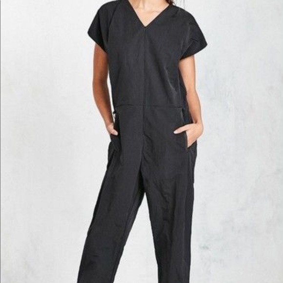 NIKE Long Sleeve Nylon Jumpsuit in white - Wheretoget